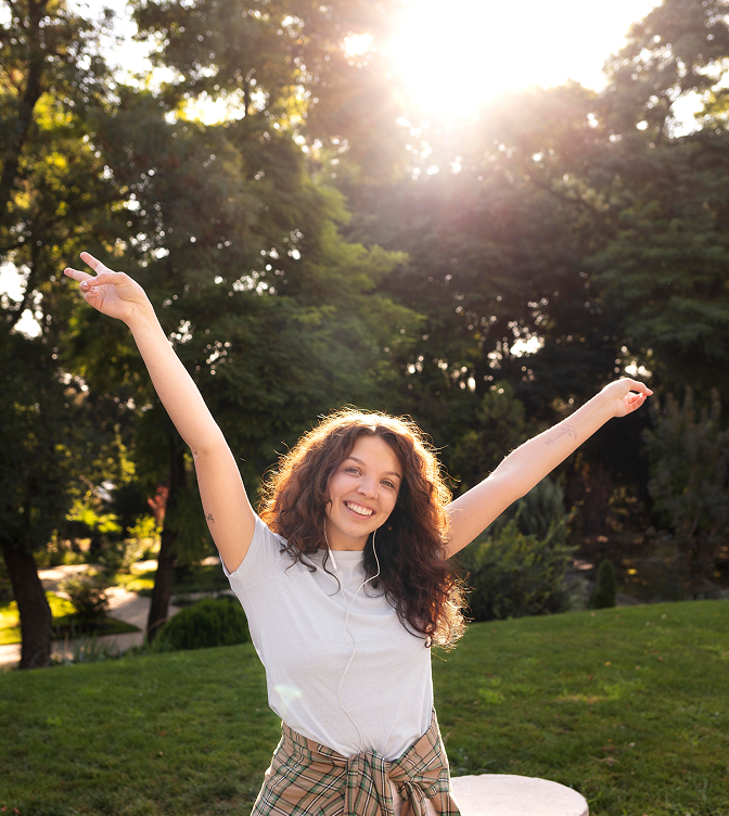 Woman feeling free and happy in nature
